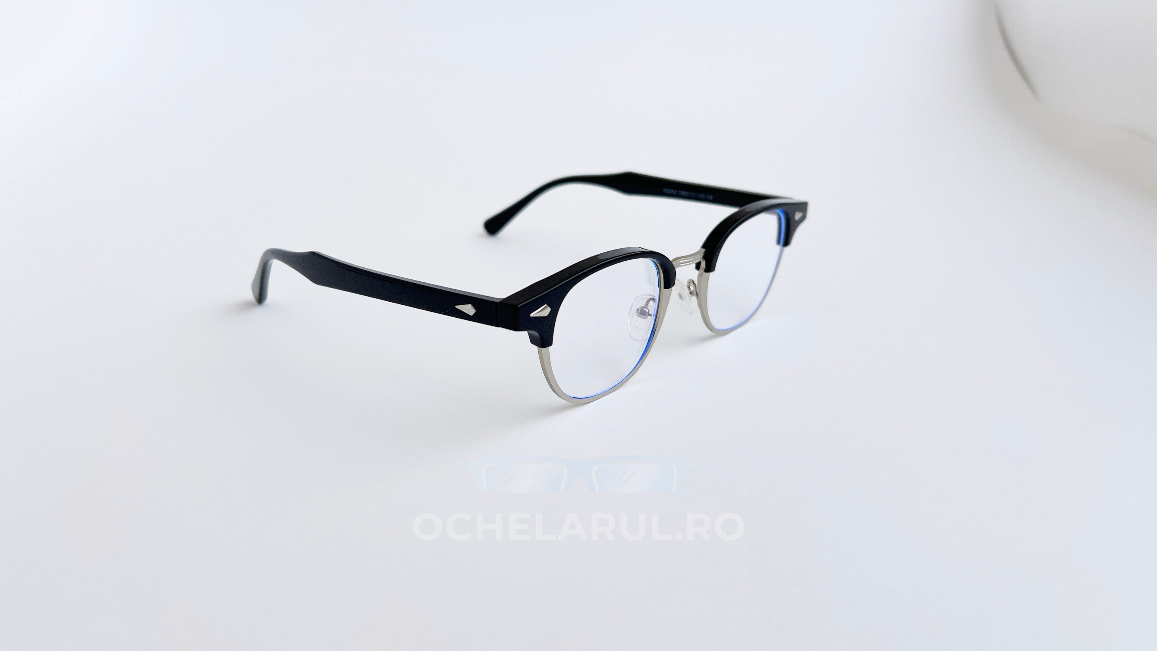 Rame ochelari browline, rama negru-argintiu si lentile transparente, prezentare