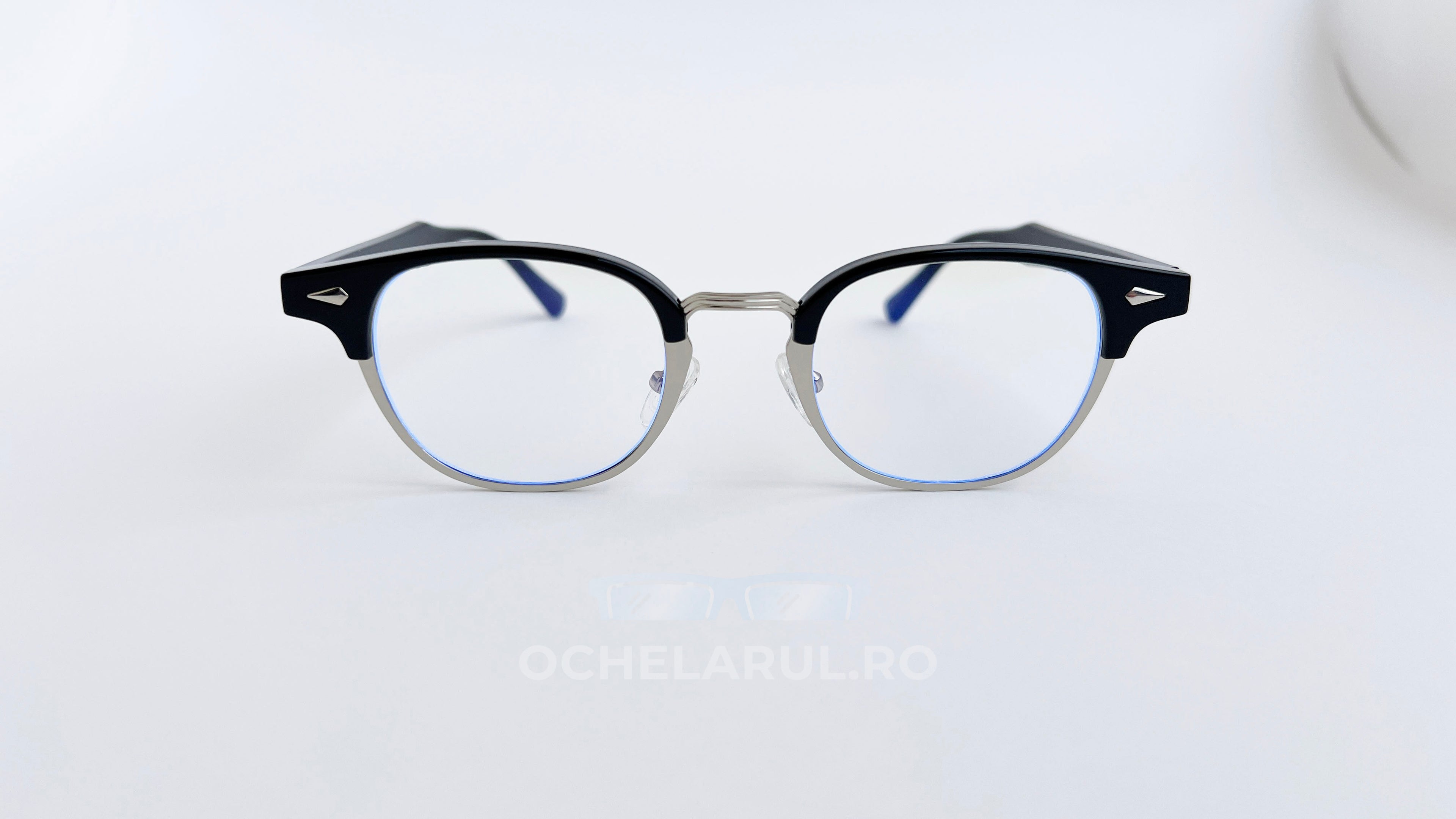 Rame ochelari browline, rama negru-argintiu si lentile transparente, vedere fata aproape