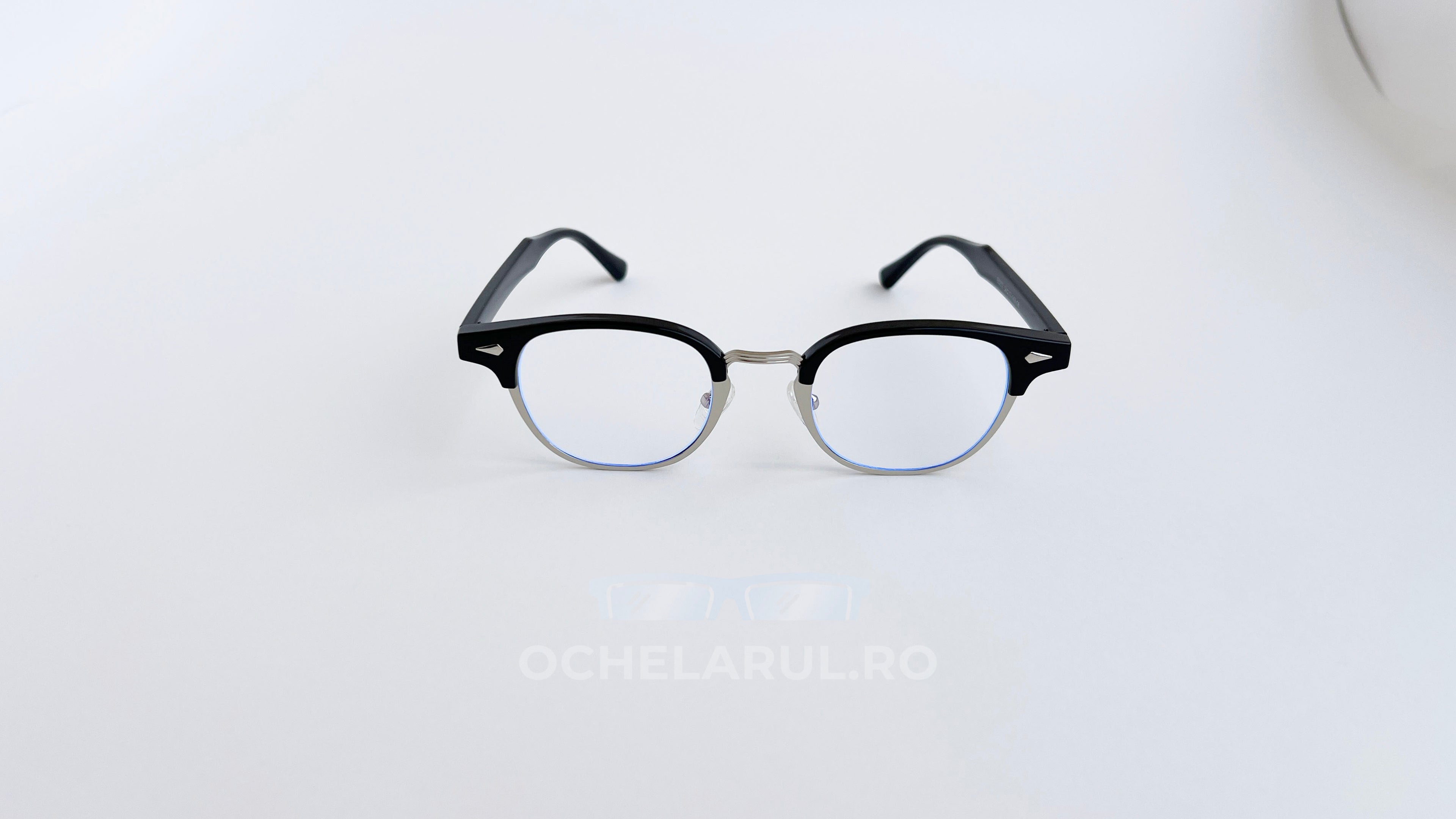 Rame ochelari browline, rama negru-argintiu si lentile transparente, vedere fata