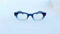 Rame ochelari Dreptunghiulare Elegante cu design albastru în degrade, lentile transparente, stil modern și rafinat.