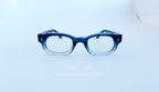 Rame ochelari Dreptunghiulare Elegante cu design albastru în degrade, lentile transparente, stil modern și rafinat.