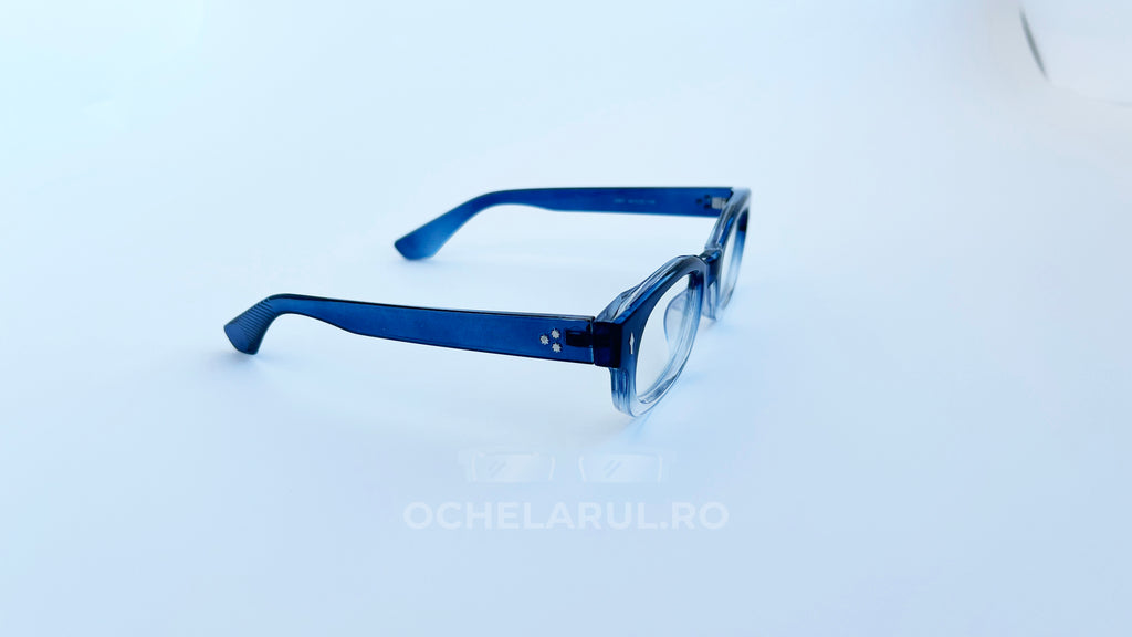 Rame ochelari Dreptunghiulare Elegante albastre transparente, cu design modern și rafinat, ideale pentru purtători de lentile.