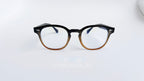 Rame ochelari Large Moscot Style cu lentile transparente și ramă maro degrade, design clasic și elegant.