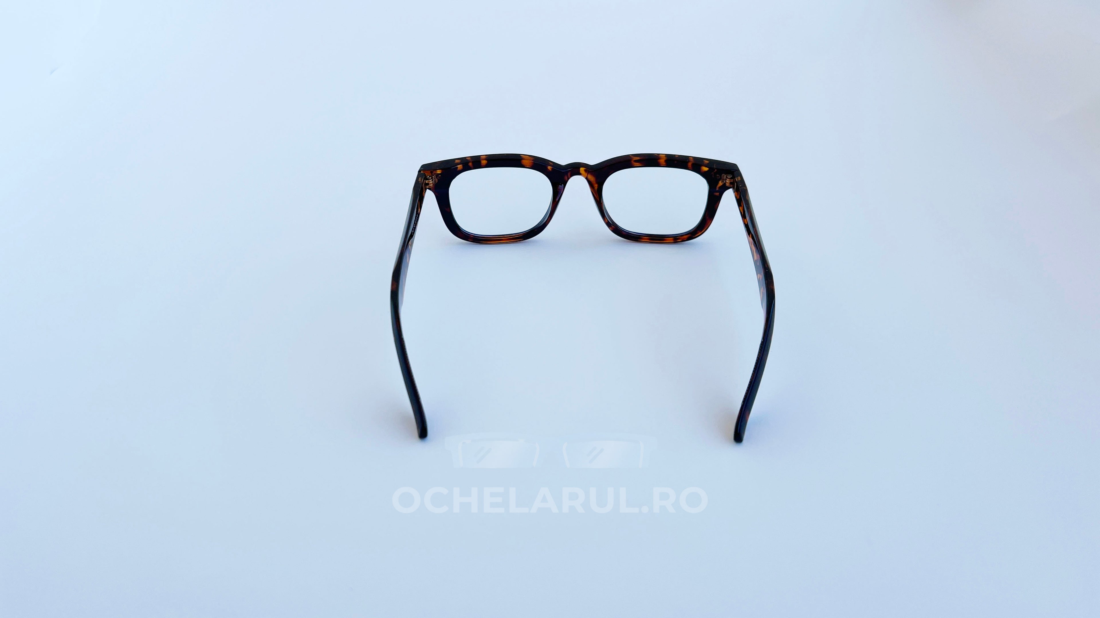 Rame ochelari Moscot Klutz Style cu model animal print și lentile transparente, design unisex.