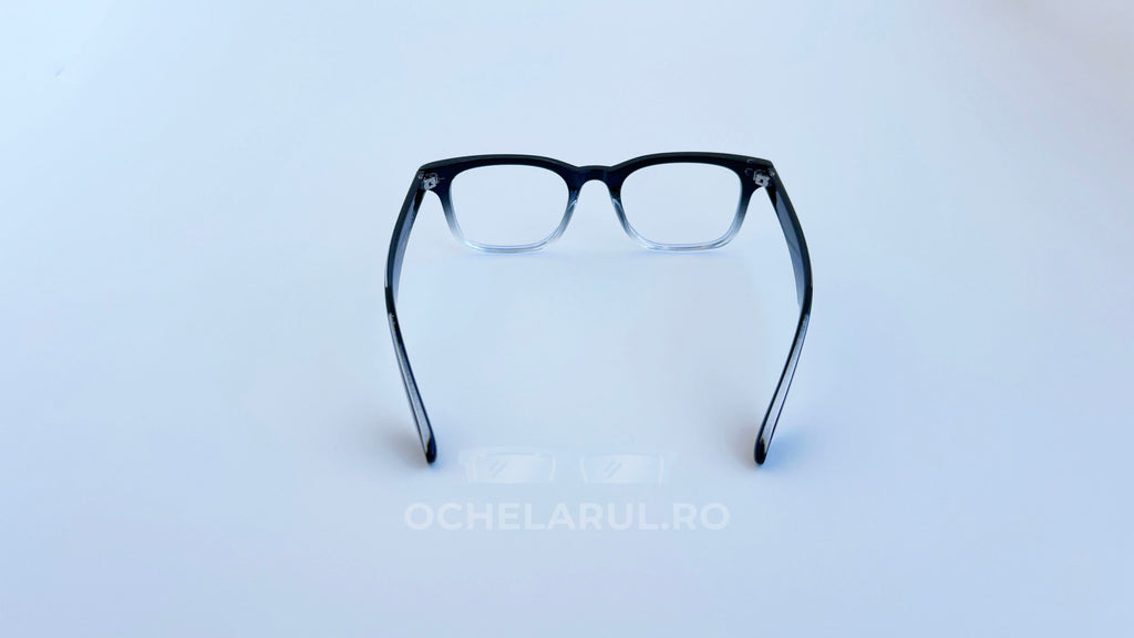 Rame ochelari Moscot Klutz Style negre degradate cu lentile transparente, design clasic și elegant.