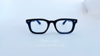 Rame ochelari Moscot Klutz Style negre cu lentile transparente, design clasic și modern, disponibile pe ochelarul.ro