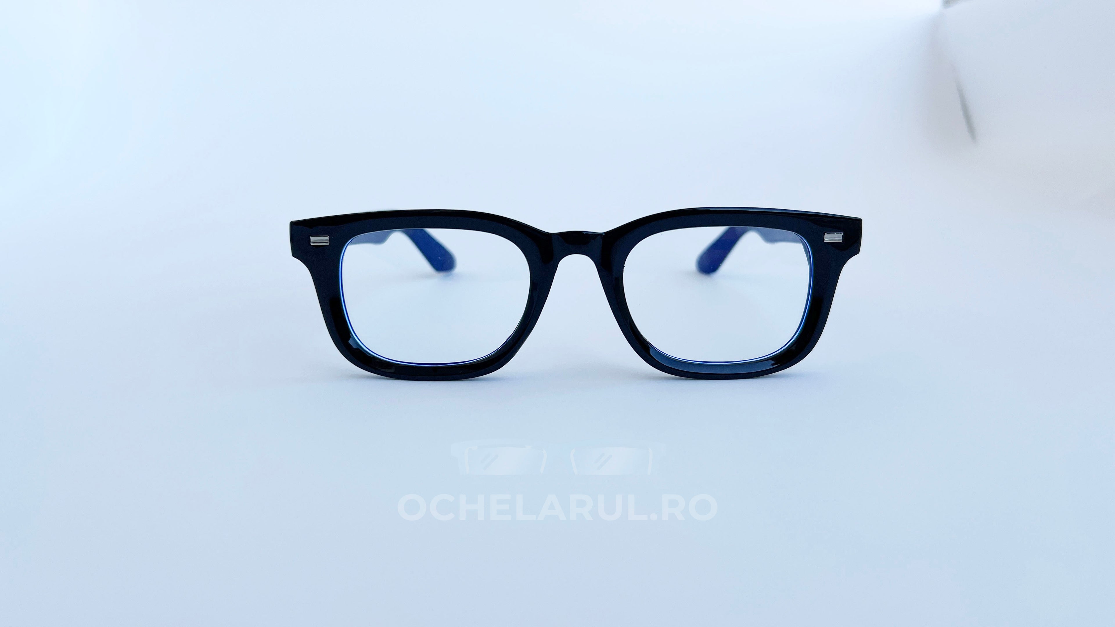 Rame ochelari Moscot Klutz Style negre cu lentile transparente, design clasic și modern, disponibile pe ochelarul.ro