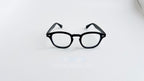 Rame ochelari Moscot Lemtosh Style negre, unisex, cu lentile transparente, design clasic și elegant.