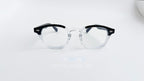 Rame ochelari Moscot Lemtosh Style cu design transparent și negru, ideale pentru ochelari cu lentile clare.