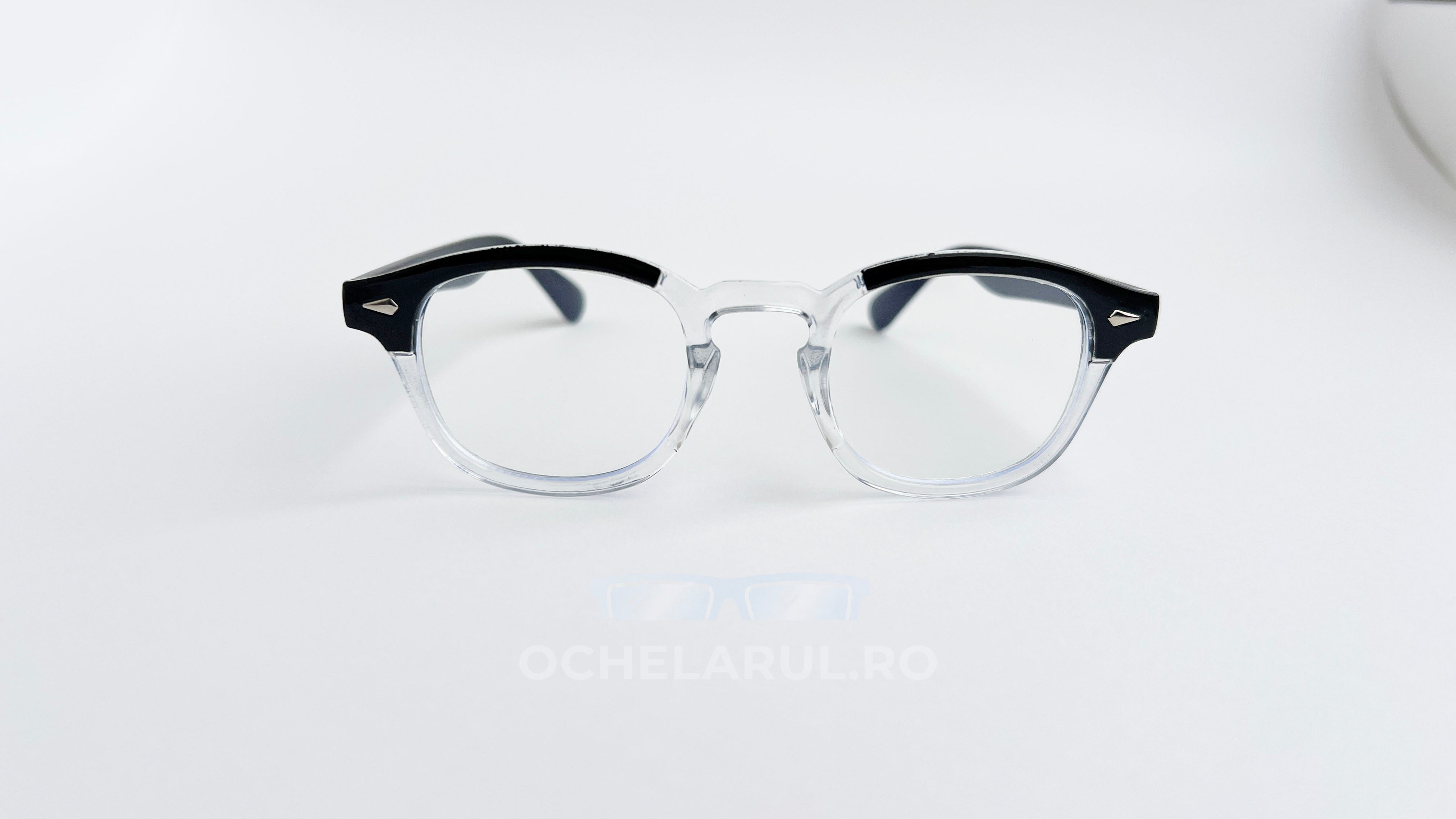 Rame ochelari Moscot Lemtosh Style cu design transparent și negru, ideale pentru ochelari cu lentile clare.
