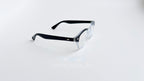 Rame ochelari Moscot Lemtosh Style cu lentile transparente și brațe negre, design clasic și elegant.