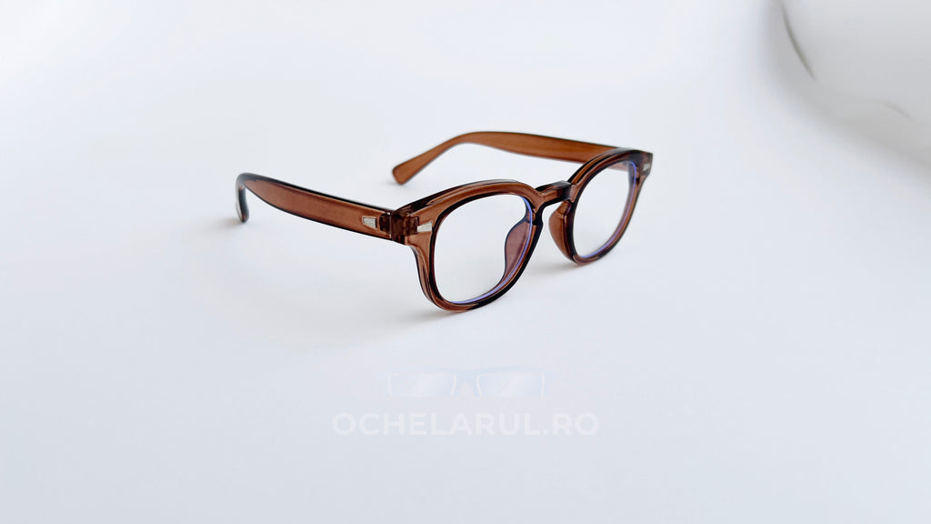 Rame ochelari Moscot Style maro transparent cu lentile clare, design clasic și elegant pentru ochelari de vedere.