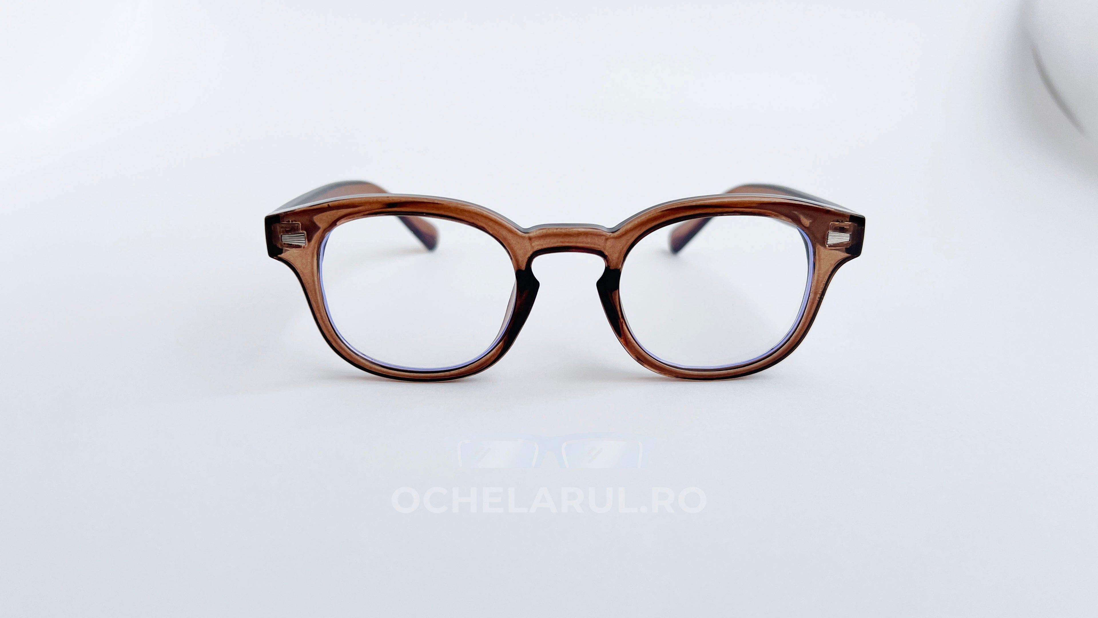 Rame ochelari Moscot Style cu lentile transparente și cadru maro translucid pentru un look modern și elegant