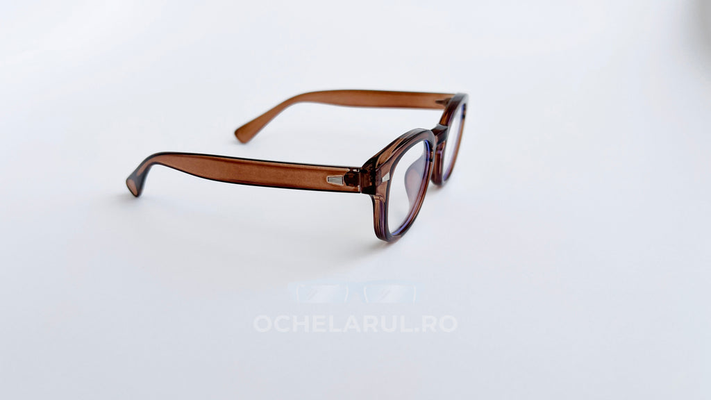 Rame ochelari Moscot Style maro transparent, cu lentile clare și design clasic unisex pentru ochelari de vedere.