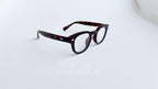 Rame ochelari Moscot Style cu model tortoise și lentile transparente, potrivite pentru ochelari de vedere.
