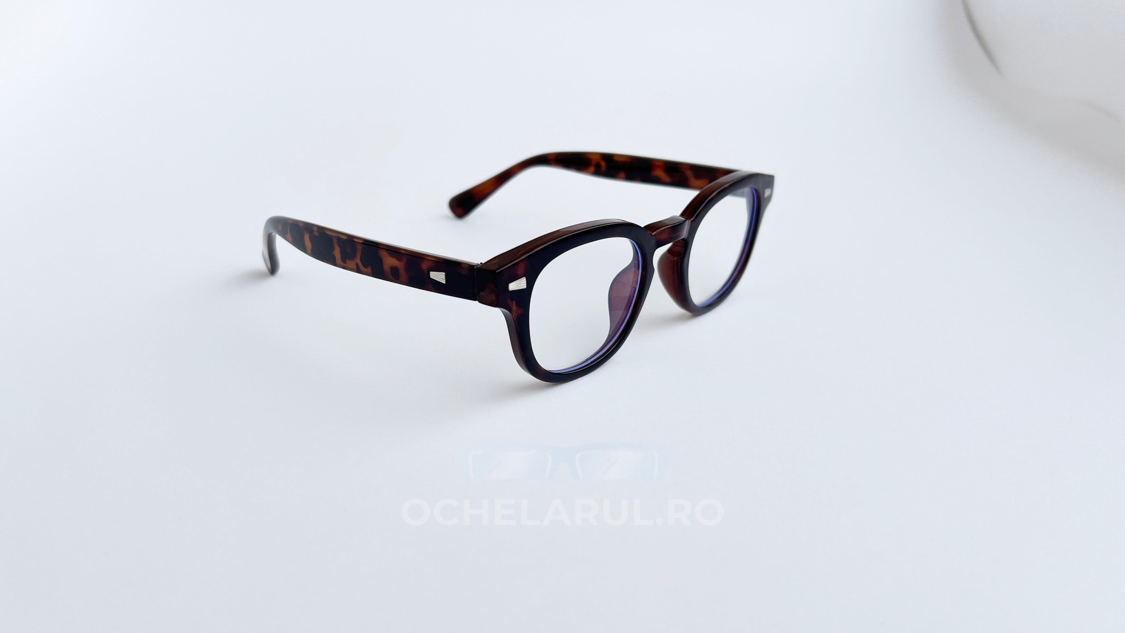 Rame ochelari Moscot Style cu model tortoise și lentile transparente, potrivite pentru ochelari de vedere.