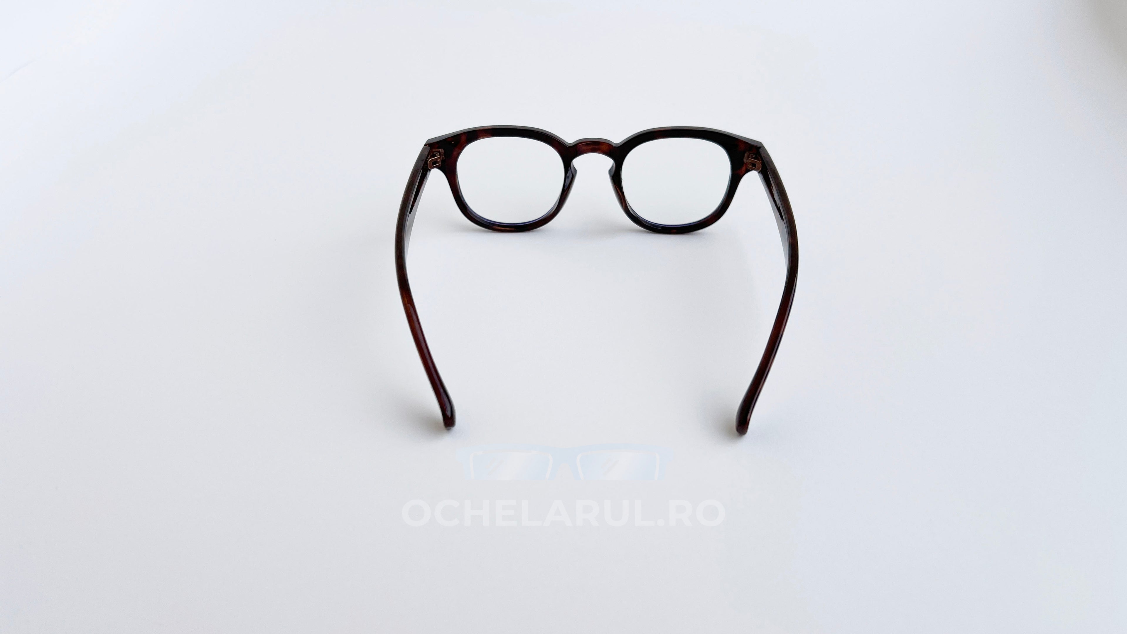 Rame ochelari Moscot Style cu design tortoise și lentile transparente ideale pentru ochelari de vedere.