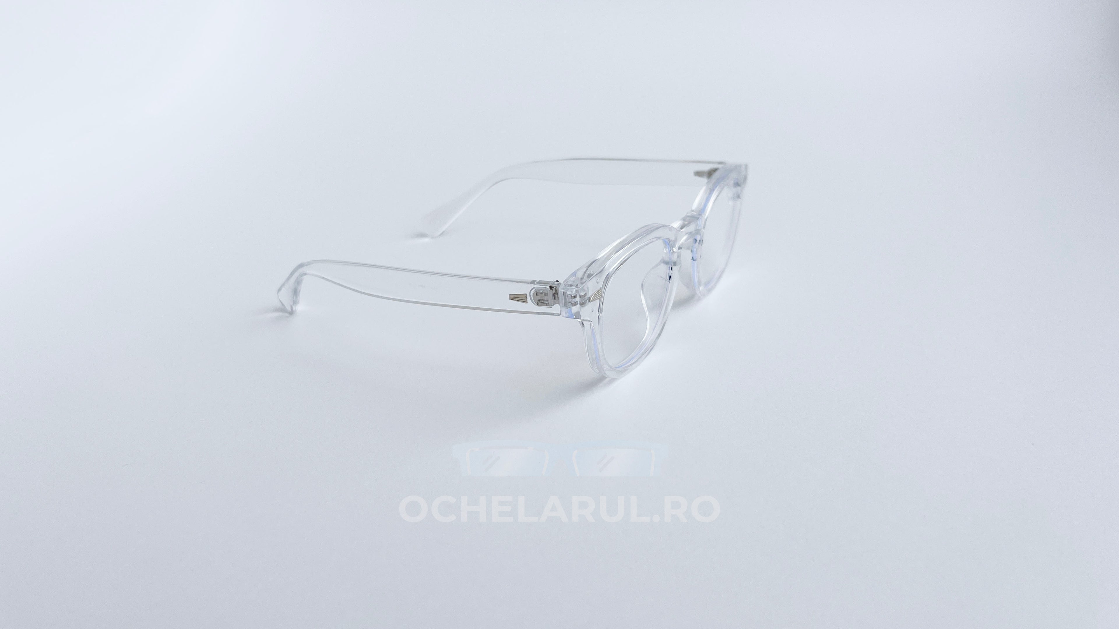 Rame ochelari Moscot Style transparente, cu design clasic și lentile transparente, pe fundal alb.