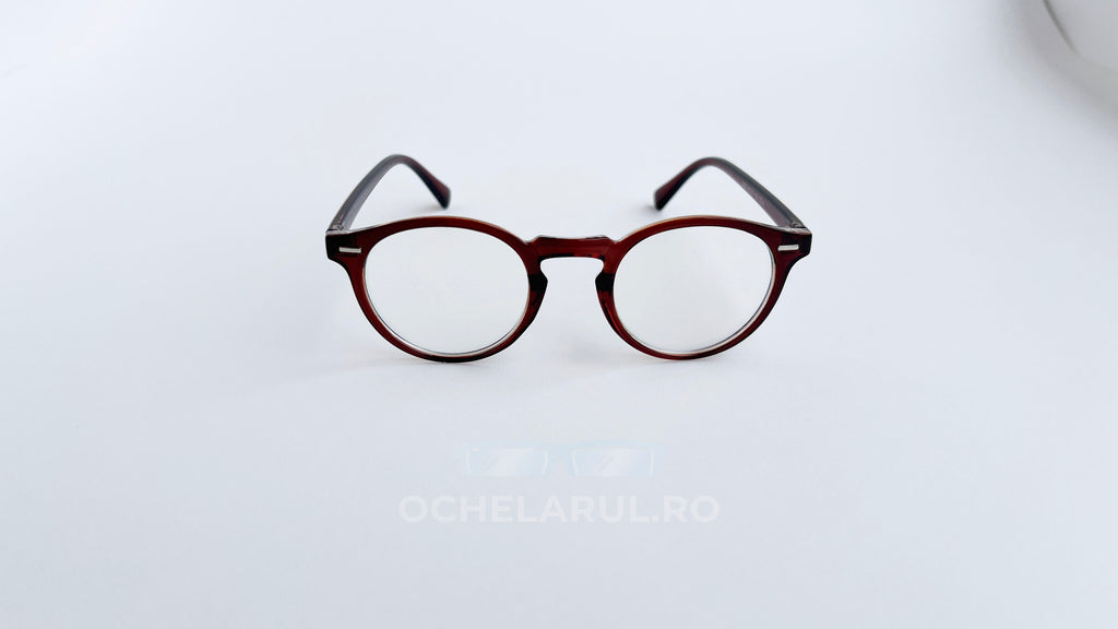 Rame ochelari Oliver Peoples Style cu design rotund și culoare maro degrade, lentile transparente elegante.