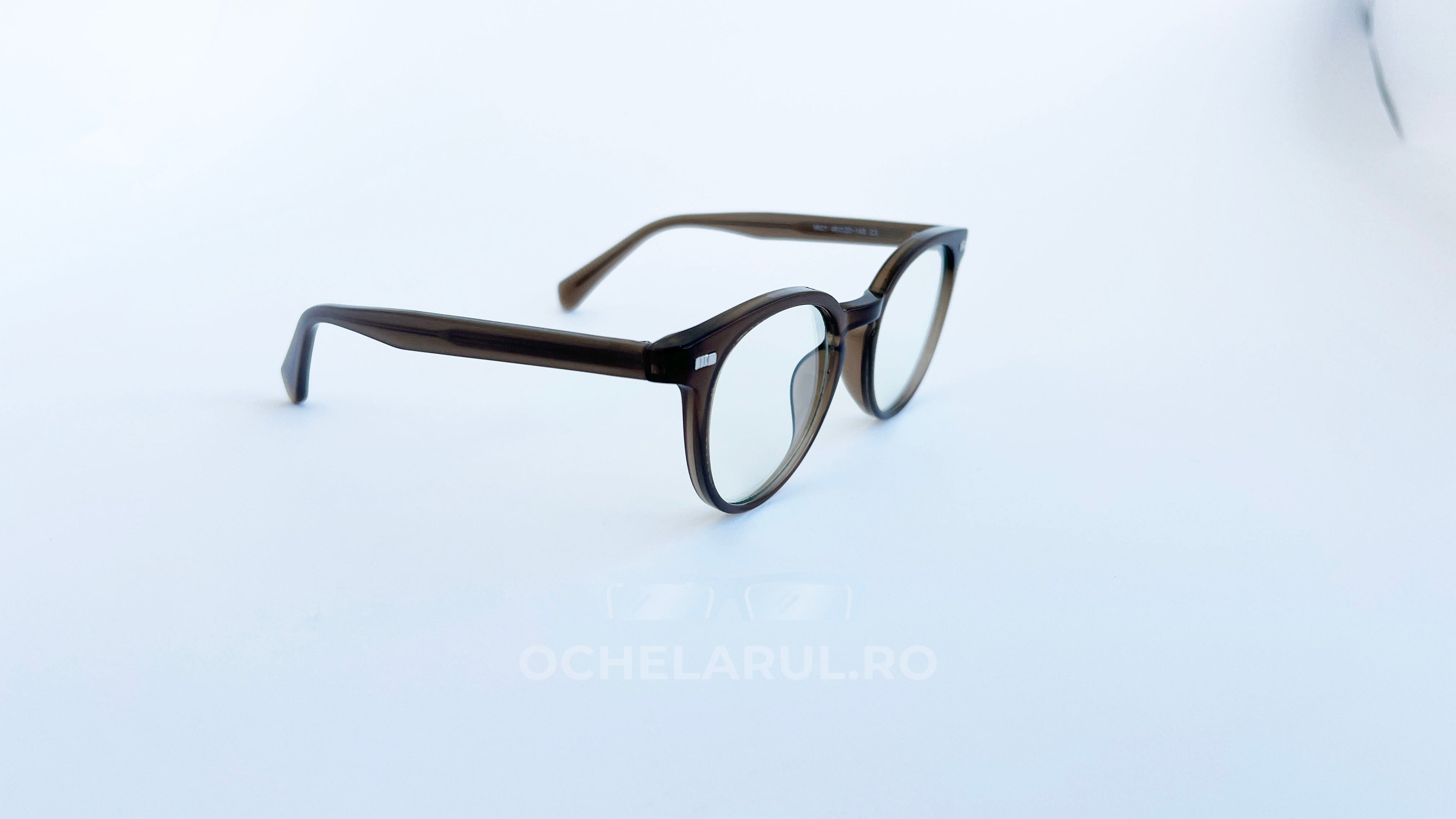 Rame ochelari Ovale Large Size din material bej, cu lentile transparente, design elegant și confort optim pentru uz zilnic, recomandate pentru ochelari de vedere.