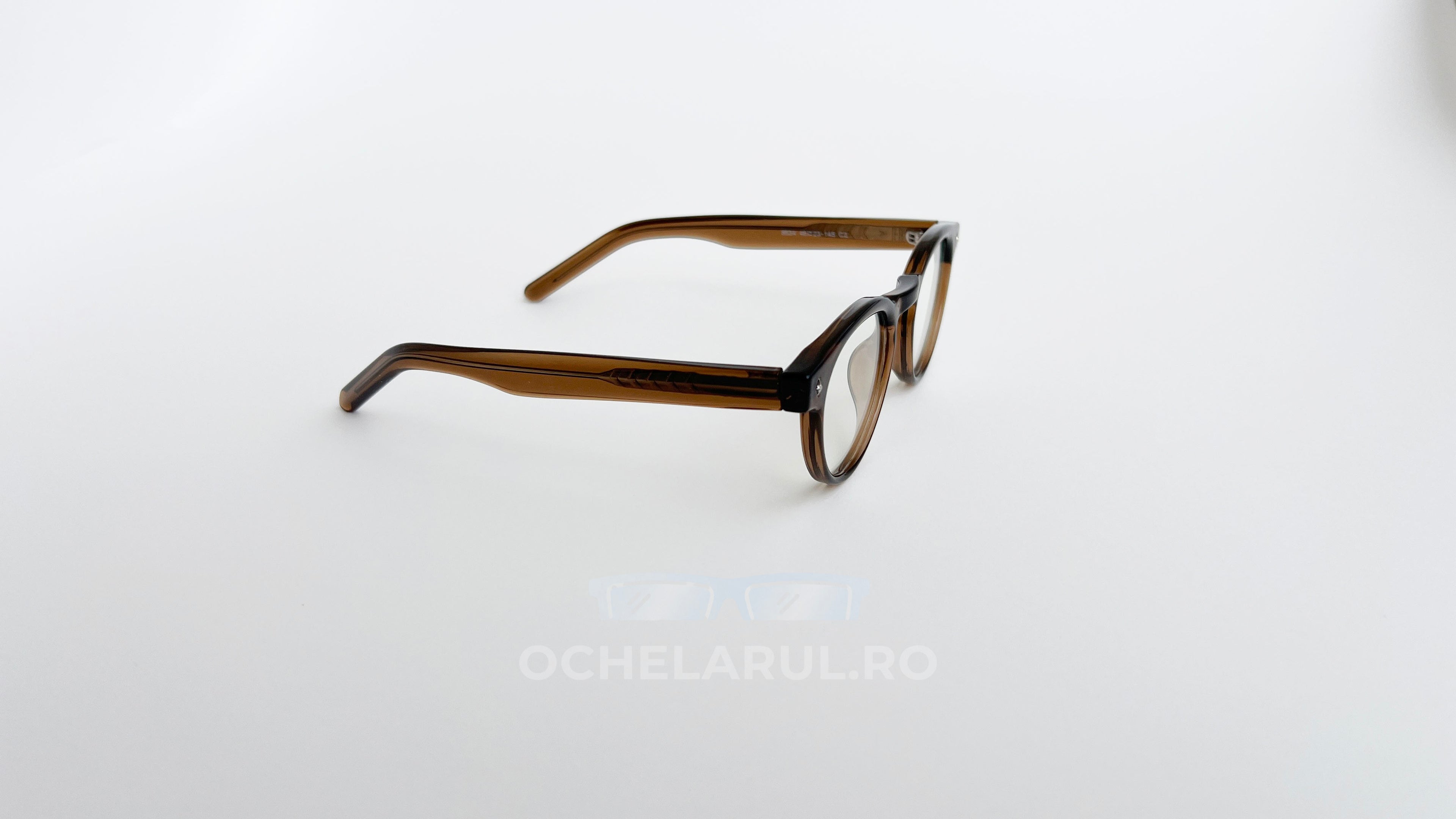 Rame ochelari Ovale Retro maro, cu lentile transparente, design vintage elegant pentru uz cotidian.