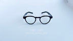 Rame ochelari Ovale Retro negre cu lentile transparente pentru un aspect vintage și elegant.