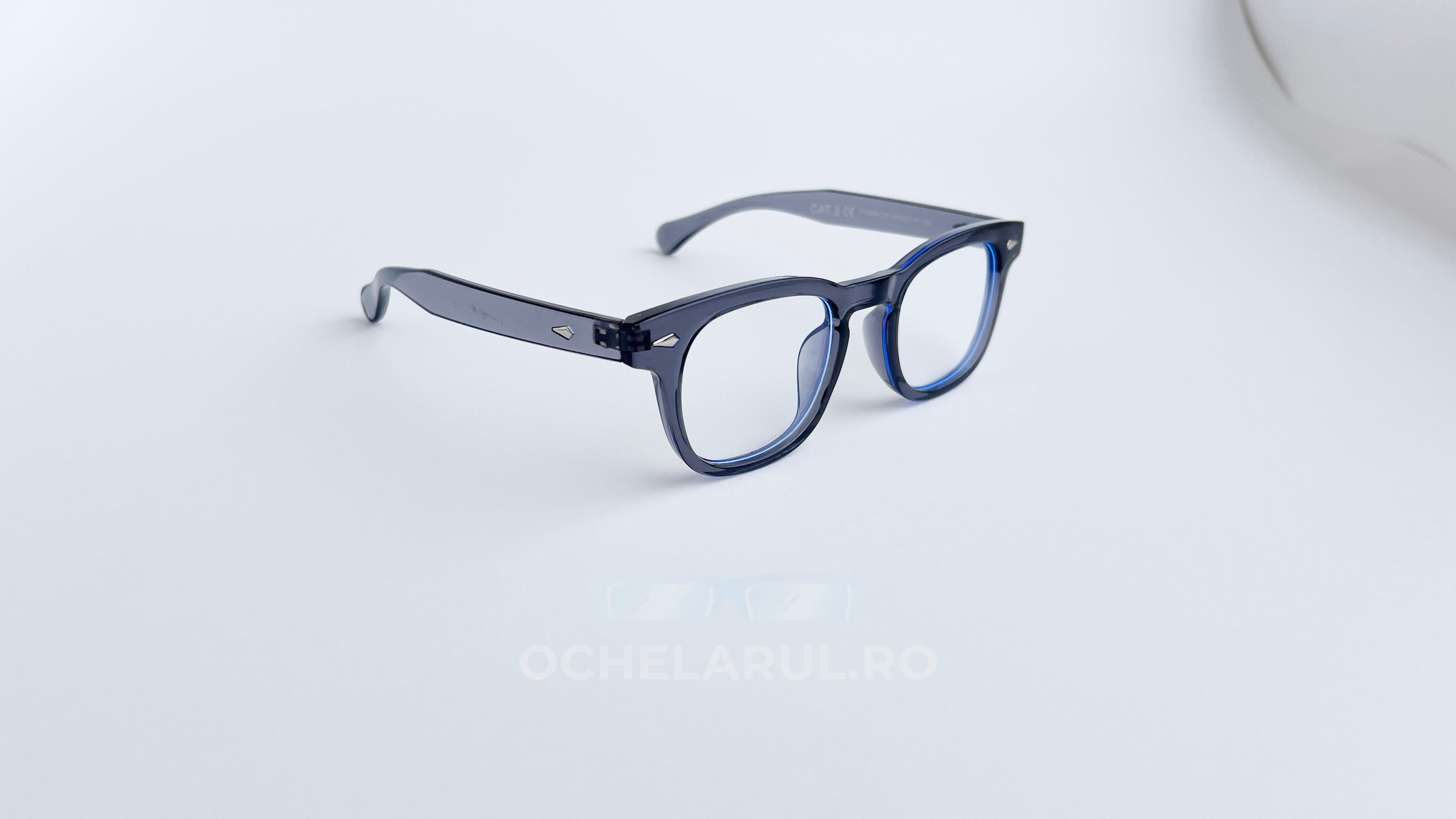 Rame ochelari Pătrate Moscot Style cu design transparent albastru, ideale pentru ochelari de vedere eleganți.