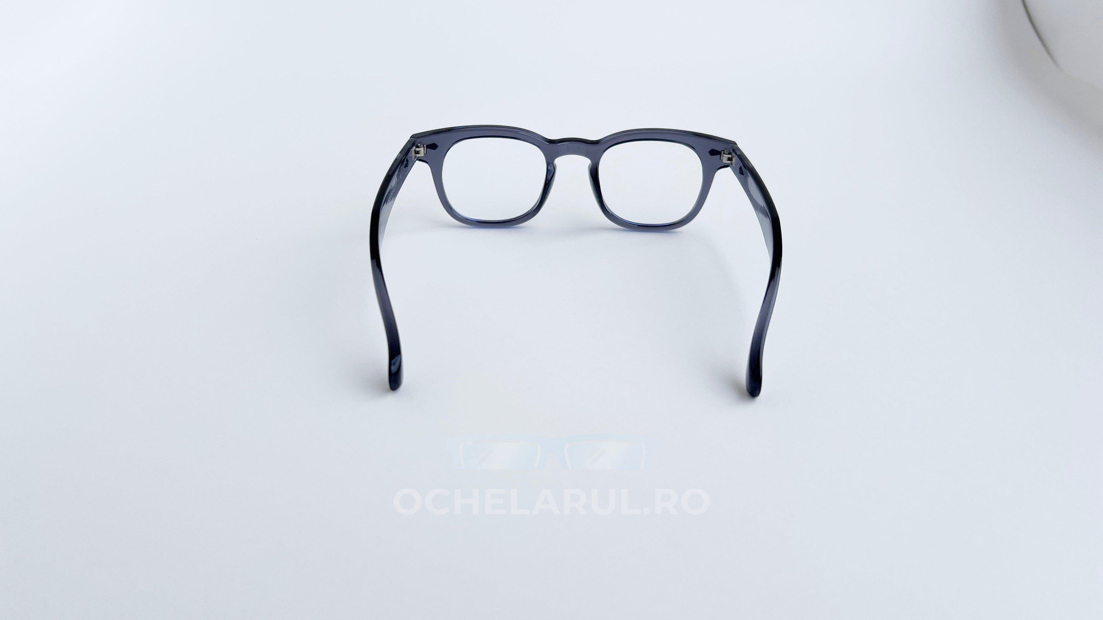 Rame ochelari Pătrate Moscot Style negre, parte a unei colecții elegante de rame ochelari cu lentile transparente.