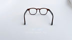Rame ochelari Pătrate Moscot Style maro transparent din material rezistent cu lentile transparente, prezentate pe fundal alb.