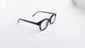 Rame ochelari Ovale Vintage negre, cu lentile transparente, ideale pentru un look clasic și elegant.
