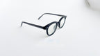 Rame ochelari Ovale Vintage negre, cu lentile transparente, ideale pentru un look clasic și elegant.