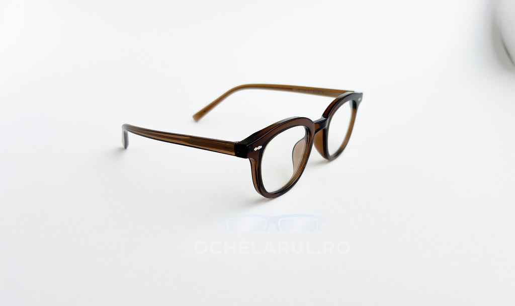 Rame ochelari Ovale Vintage maro, cu lentile transparente, design retro și elegant pentru orice stil.