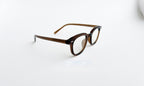 Rame ochelari Ovale Vintage maro, cu lentile transparente, design retro și elegant pentru orice stil.
