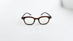 Rame ochelari Ovale Vintage, cu lentile transparente și cadru maro cu aspect clasic, potrivite pentru ochelari de vedere.
