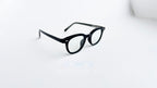 Rame ochelari Ovale Vintage negre, cu design vintage și lentile transparente, stil clasic și elegant.