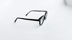 Rame ochelari Ovale Vintage negre, din material rezistent, cu lentile transparente pentru un look clasic și elegant.