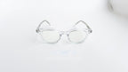 Rame ochelari Ovale Vintage cu design transparent și lentile clare, potrivite pentru un stil retro elegant.