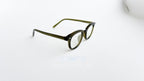 Rame ochelari Ovale Vintage de culoare verde închis, cu lentile transparente și design clasic.
