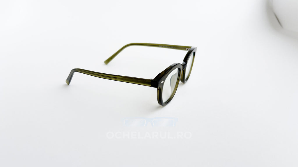 Rame ochelari Ovale Vintage cu lentile transparente și design verde închis, stil retro elegant.