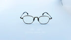 Rame ochelari Pătrați din Titan Vintage Style cu design bronz elegant și lentile transparente, ideale pentru un look rafinat și clasic oferit de ochelarul.ro.