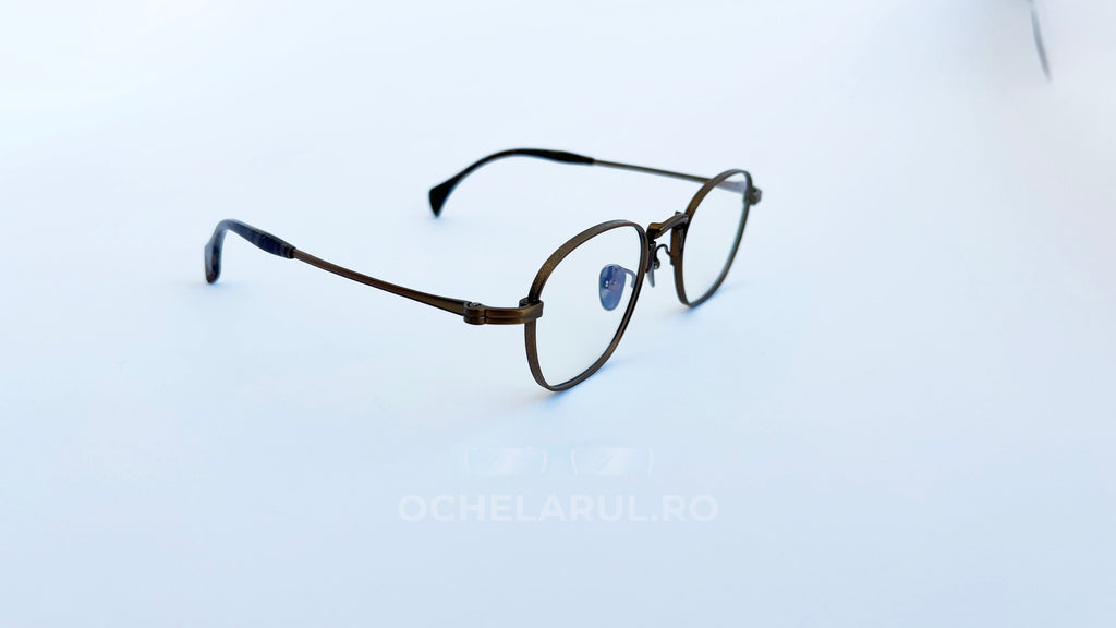 Rame ochelari Pătrați din Titan Vintage Style cu design vintage și lentile transparente, ideal pentru un look elegant și rafinat, realizate din titan rezistent.