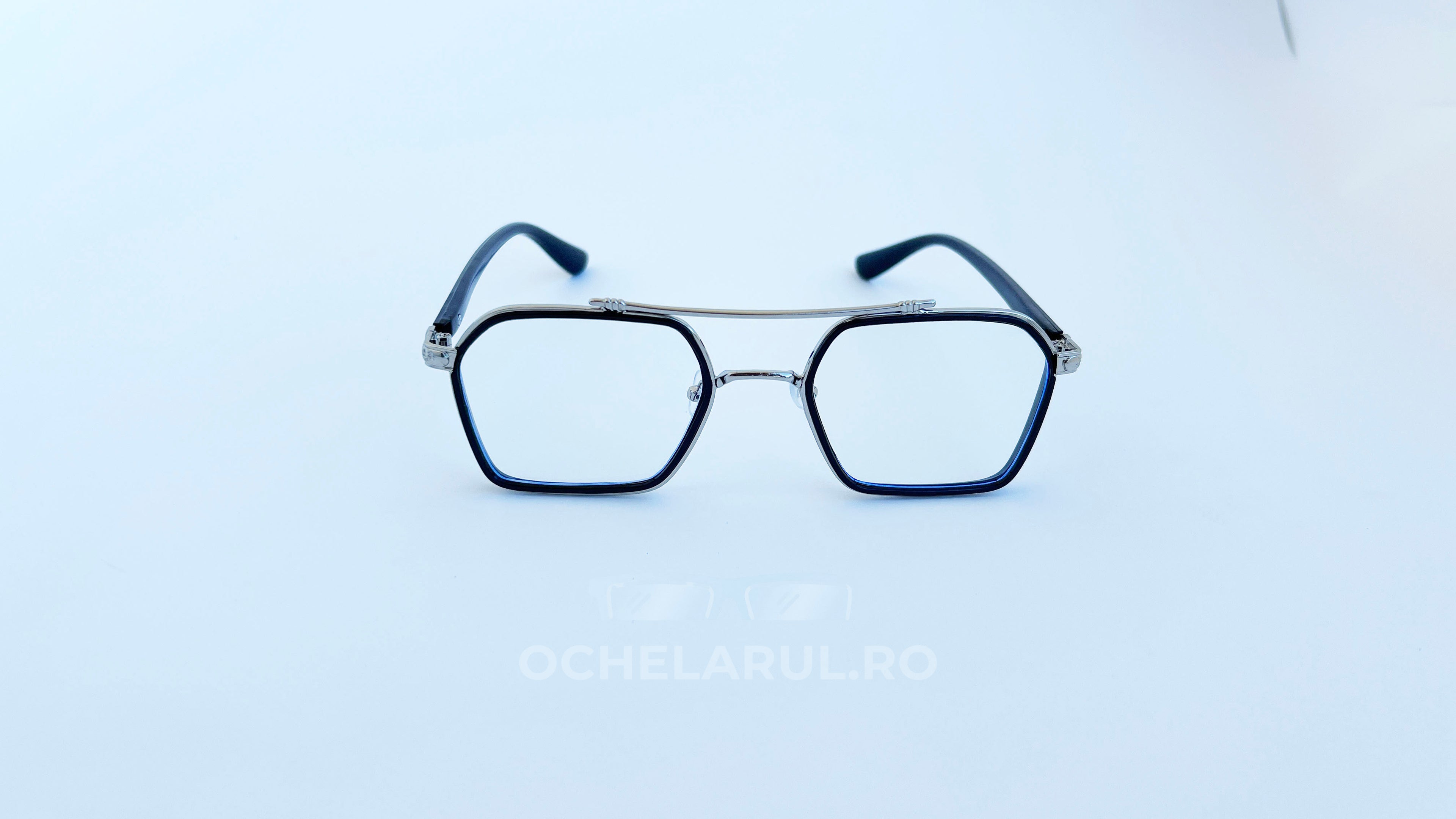 Rame ochelari cu punte dubla, rama argintie neagra si lentile transparente, vedere fata