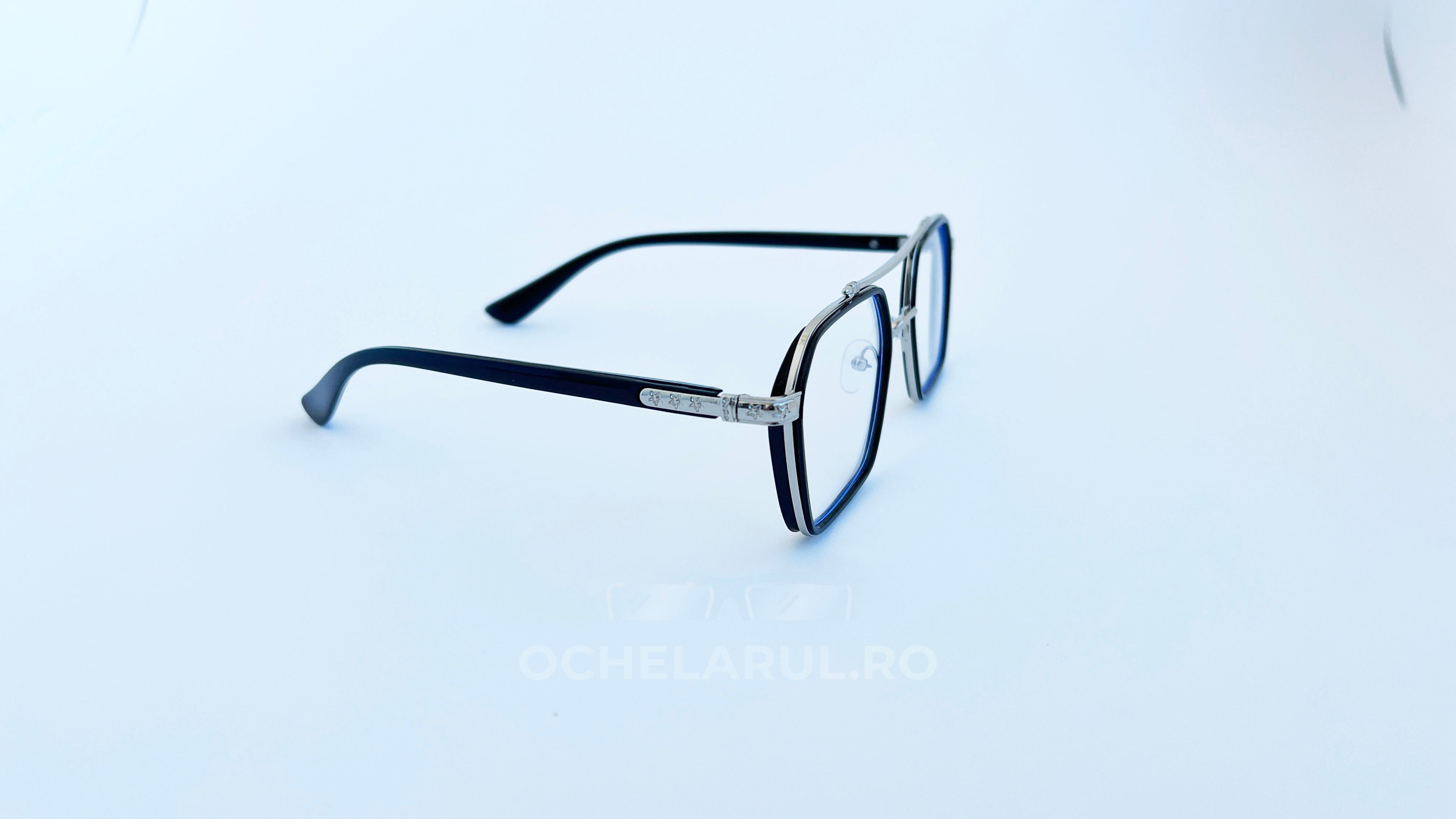 Rame ochelari cu punte dubla, rama argintie neagra si lentile transparente, vedere laterala