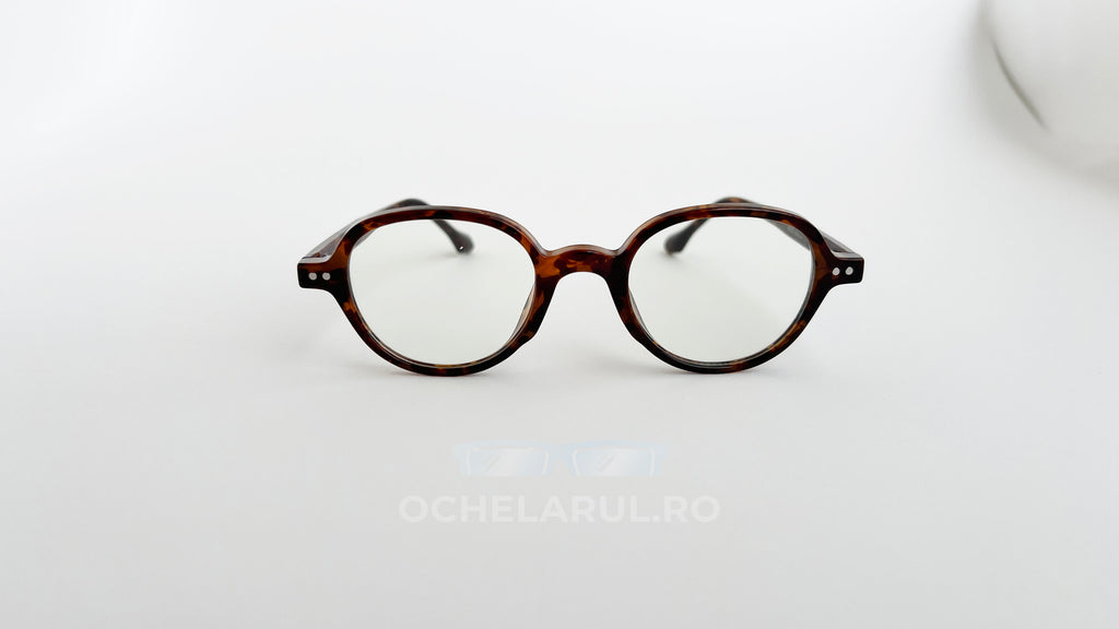 Rame ochelari Retro Style cu lentile transparente și cadru de culoare havana, design vintage unisex.