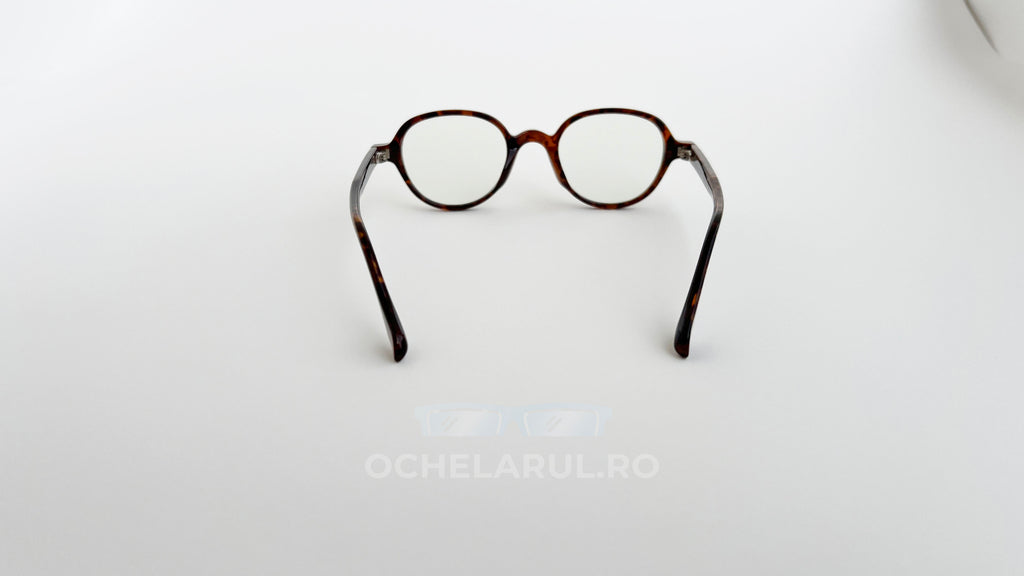 Rame ochelari Retro Style cu design retro, culoare maro Havana, lentile transparente, prezentate pe fundal alb.
