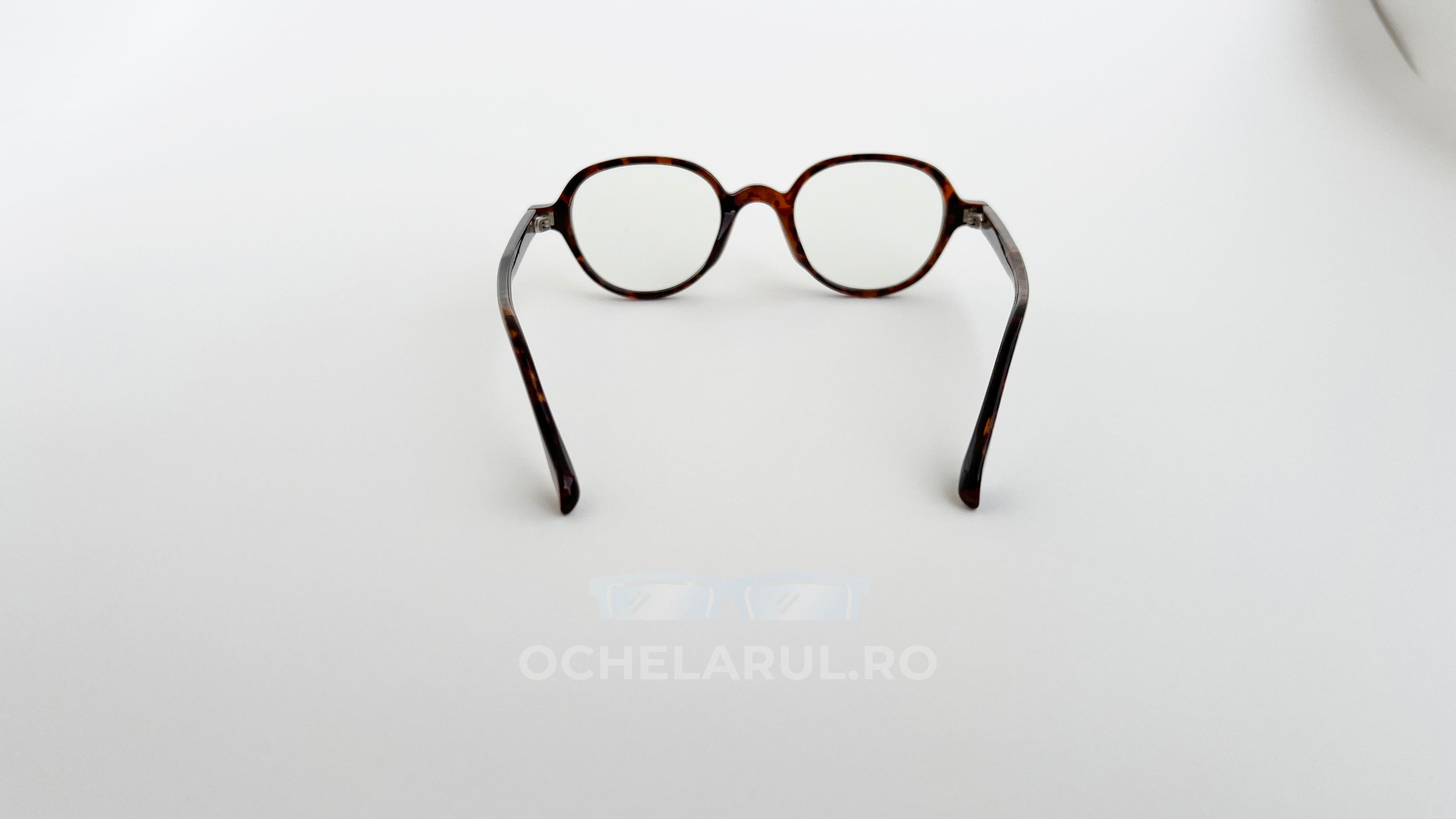 Rame ochelari Retro Style cu design retro, culoare maro Havana, lentile transparente, prezentate pe fundal alb.