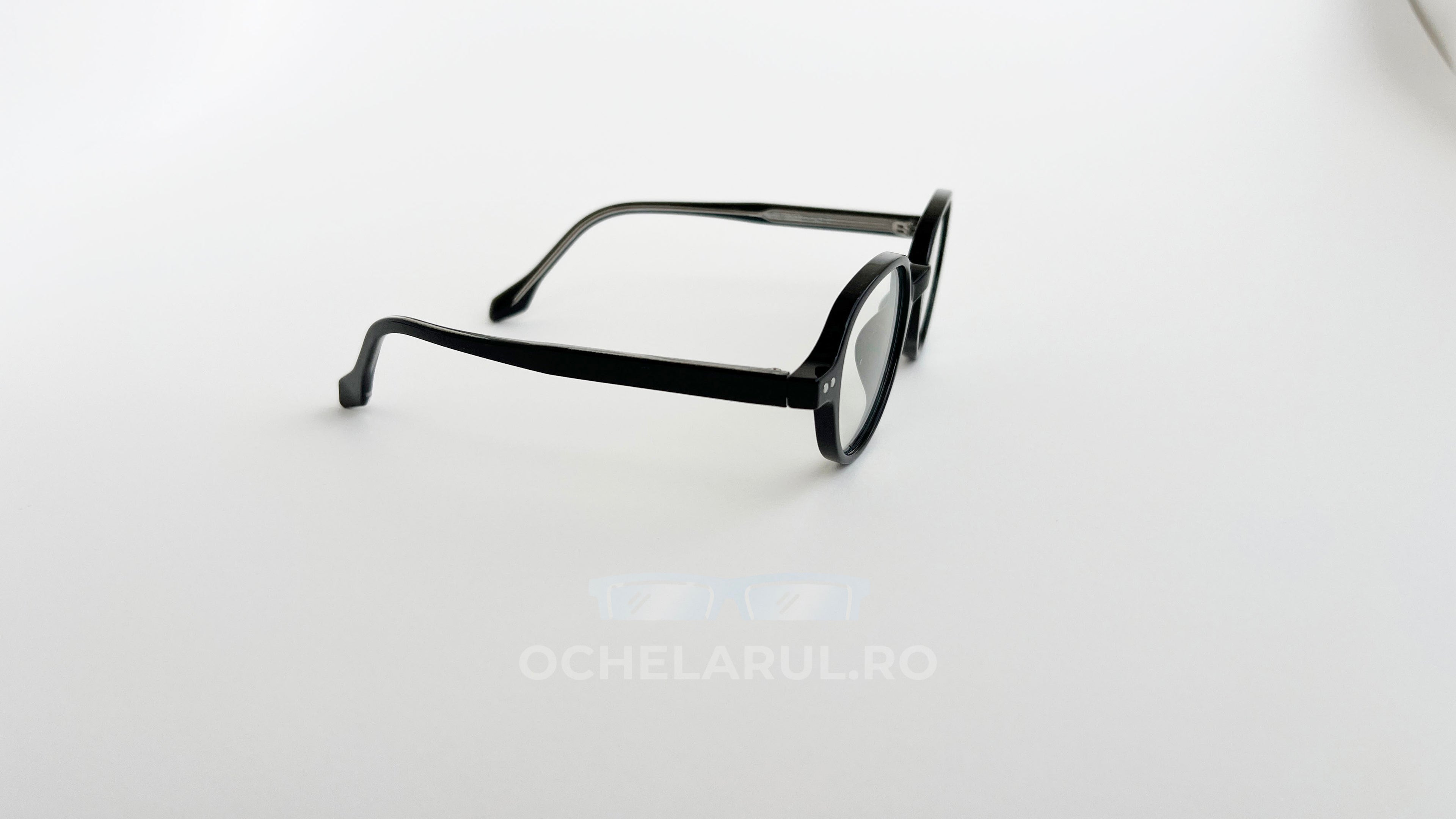 Rame ochelari Retro Style negre, cu lentile transparente, design vintage modern pentru ochelari de vedere.