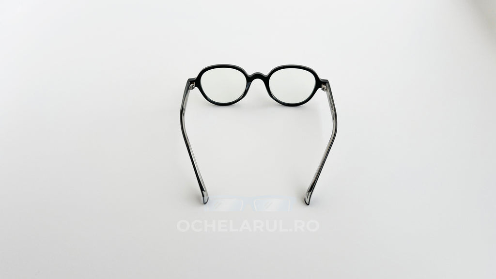 Rame ochelari Retro Style negre, cu lentile transparente, design vintage pentru un stil clasic și elegant.