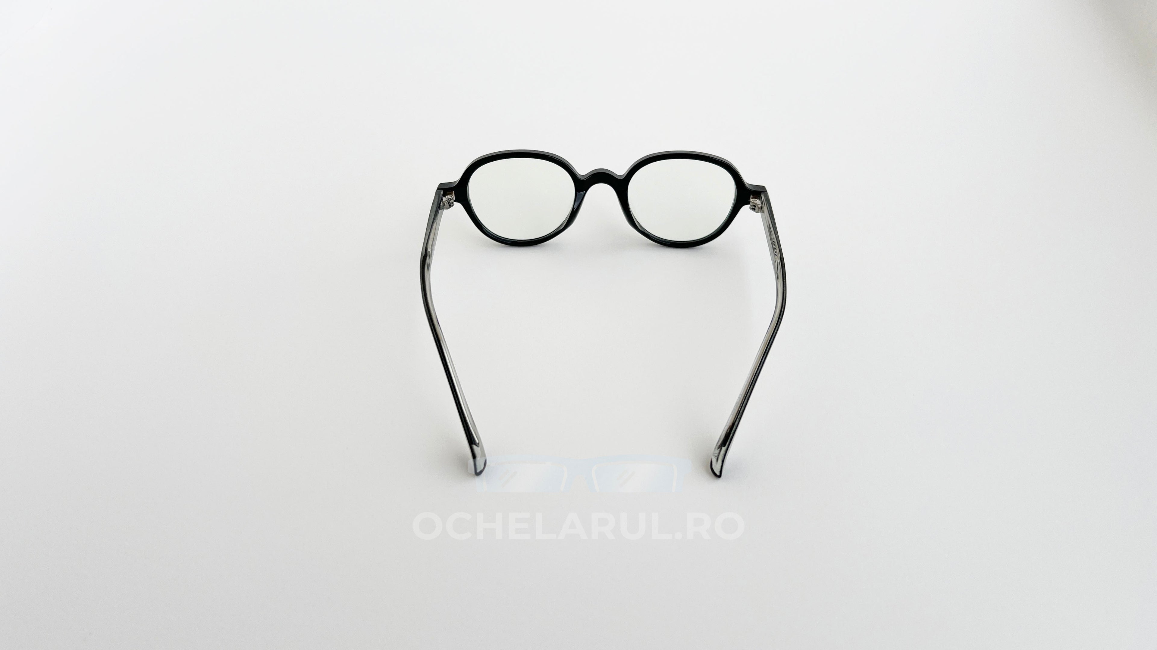 Rame ochelari Retro Style negre, cu lentile transparente, design vintage pentru un stil clasic și elegant.