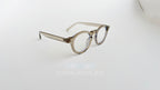 Rame Ochelari Rotunde Groase, culoare bej transparent, design retro cu lentile transparente, stil modern și elegant.